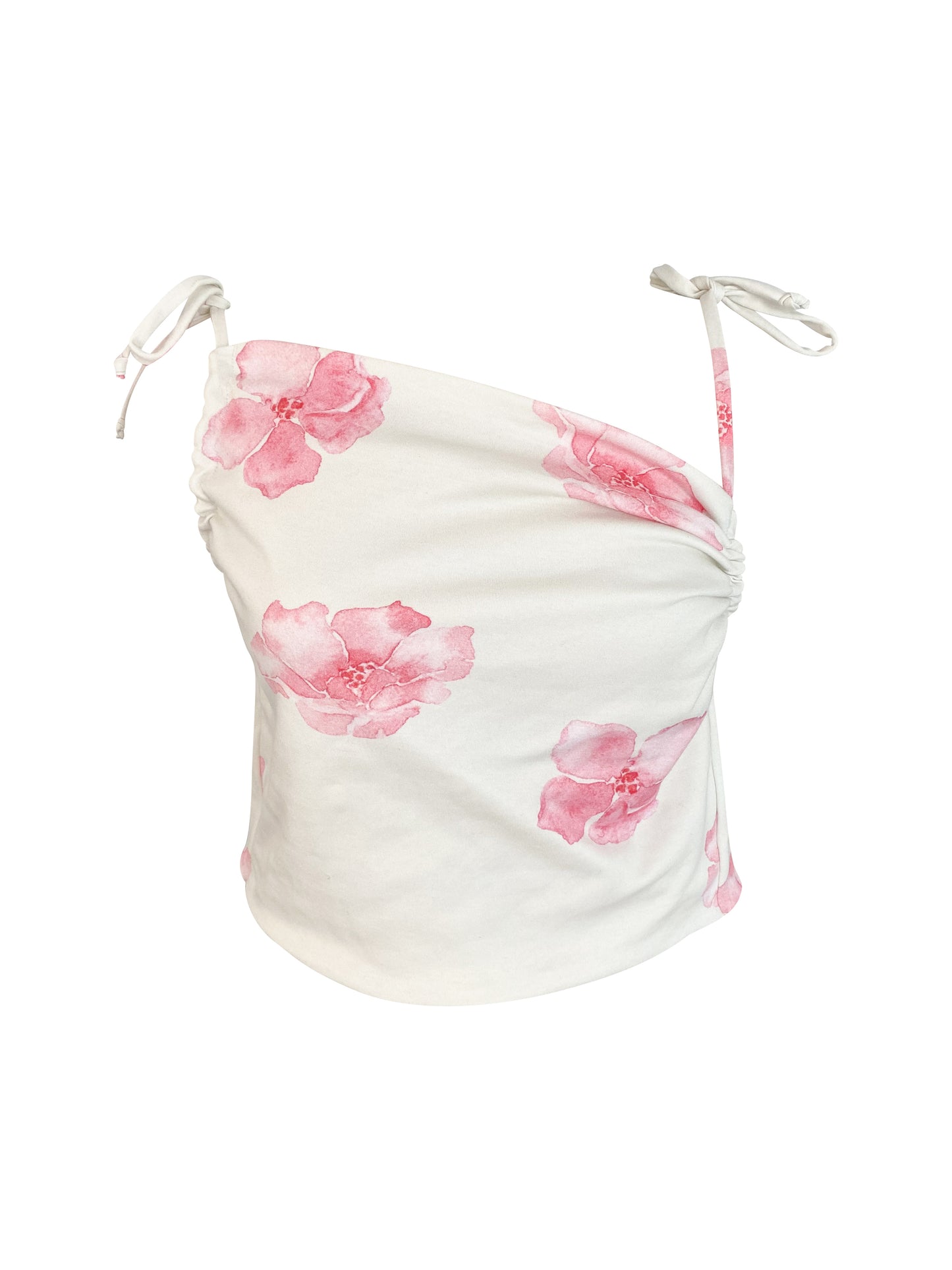 White organic cotton top with pink floral patterns on a white background
