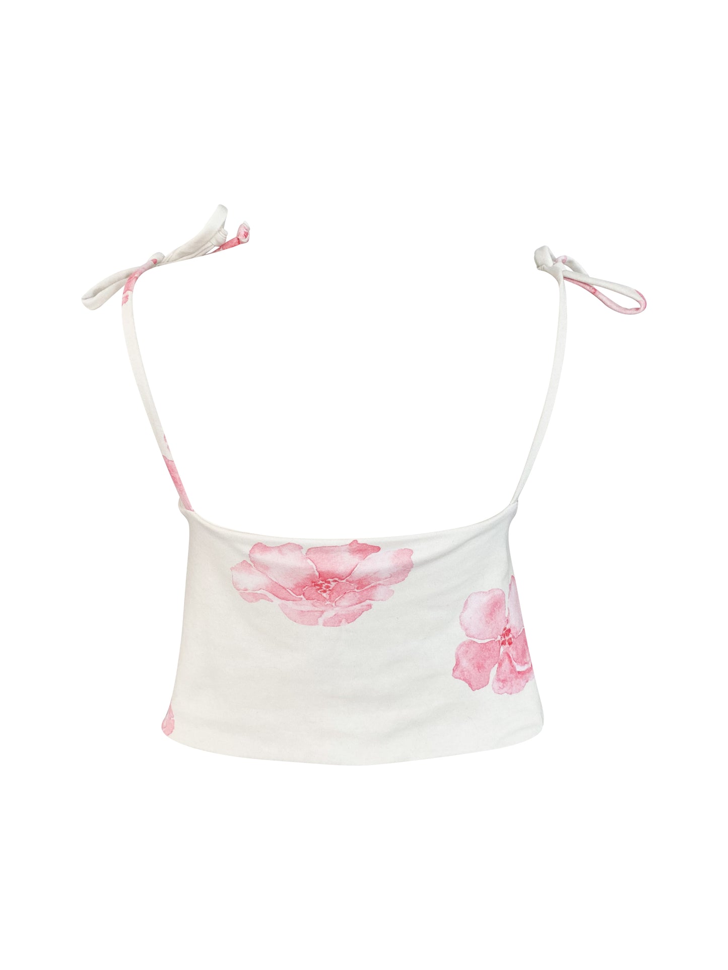 White tank top with pink floral designs on a white background
