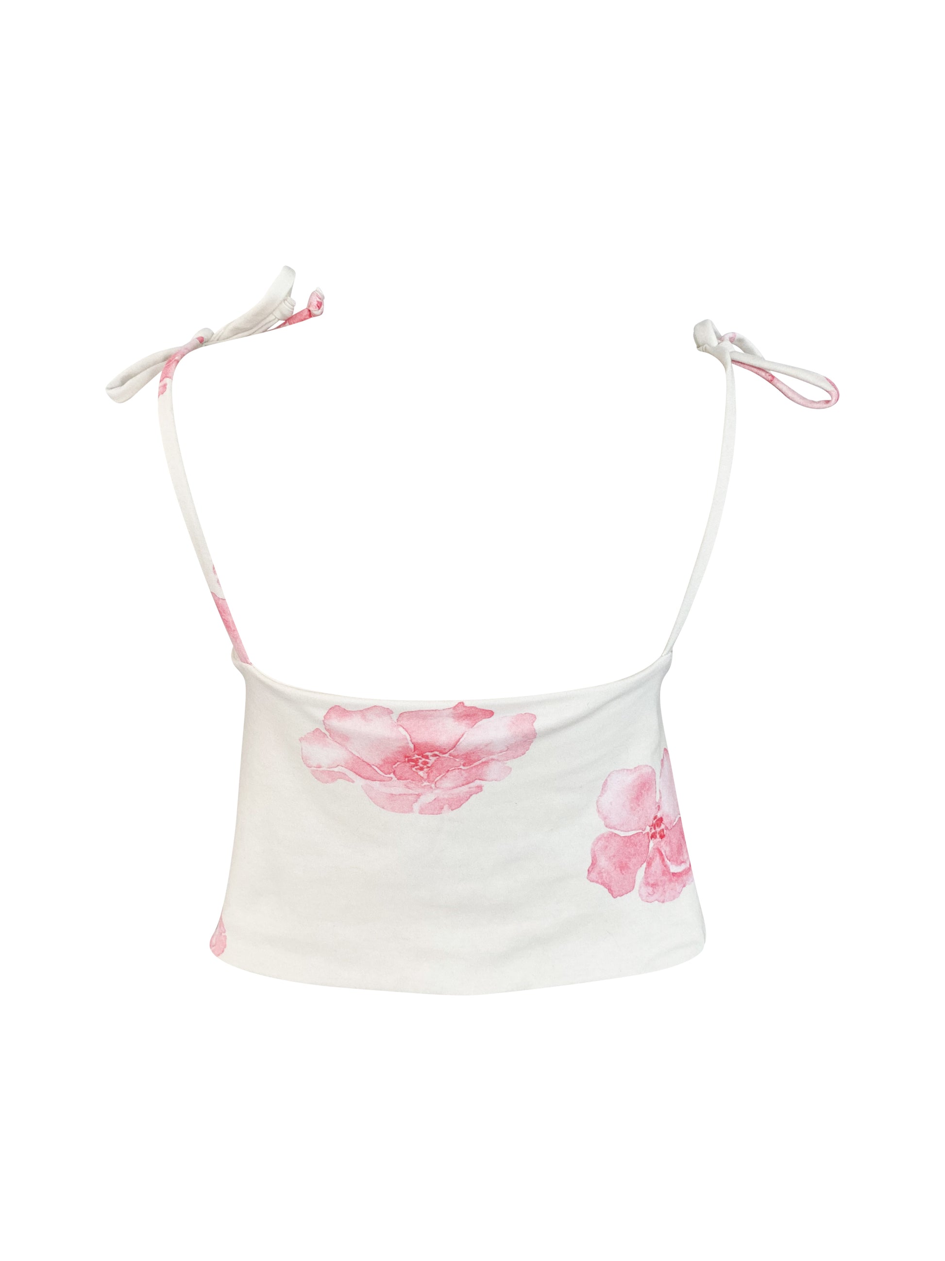 White tank top with pink floral designs on a white background